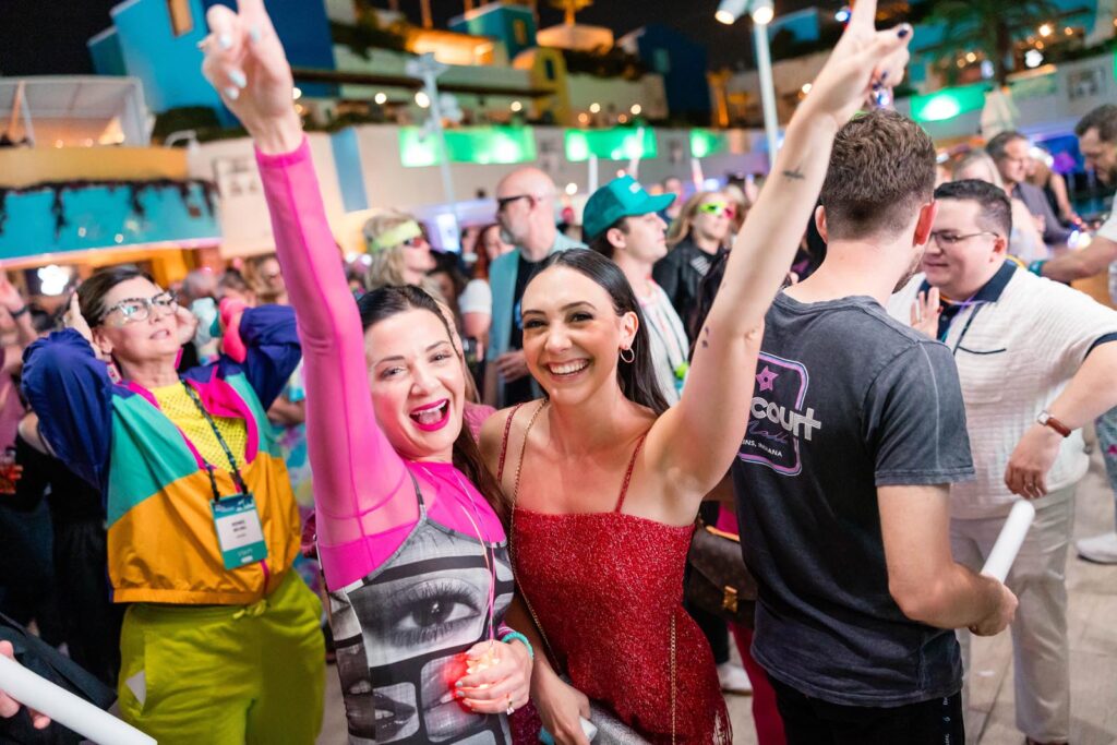 two people at industry conference party