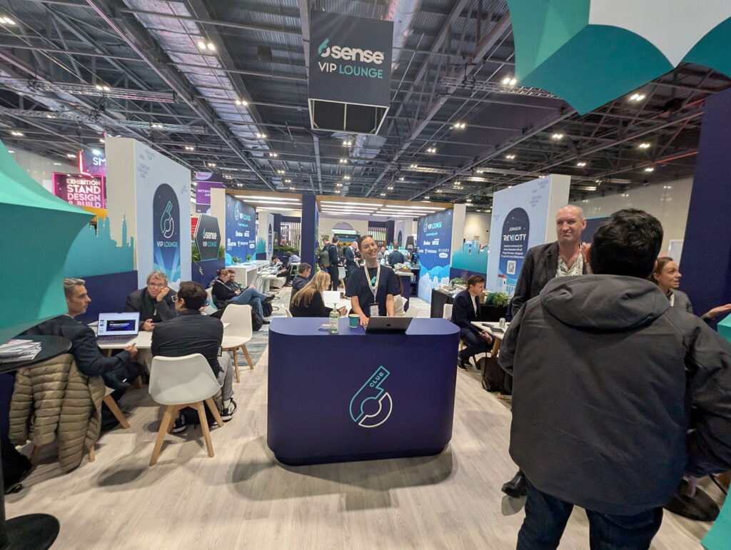 A crowded industry conference, showcasing the 6sense VIP lounge