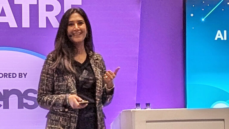 Saima presenting at a conference